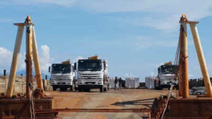 trucks_on_barge